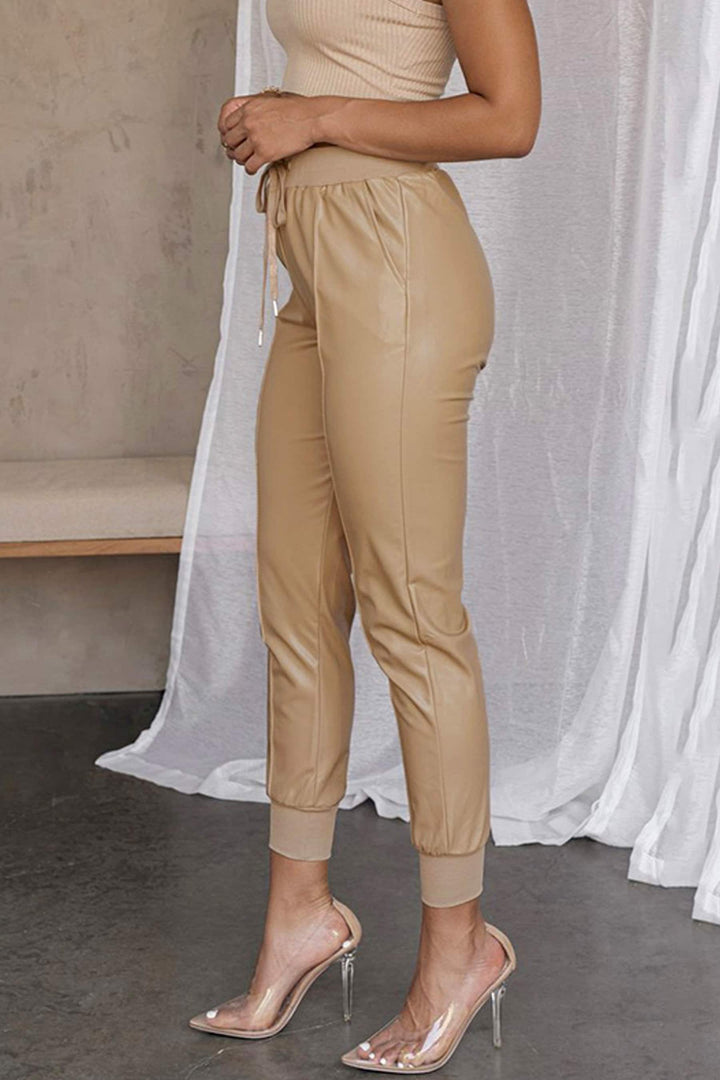 Beige Faux Leather High Waist Joggers, Leather Look Trousers, PU Leather Ankle Length Joggers, Drawstring Joggers